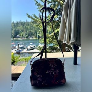 A new day burgundy with orange, red, and purple flowered crossbody handbag purse
